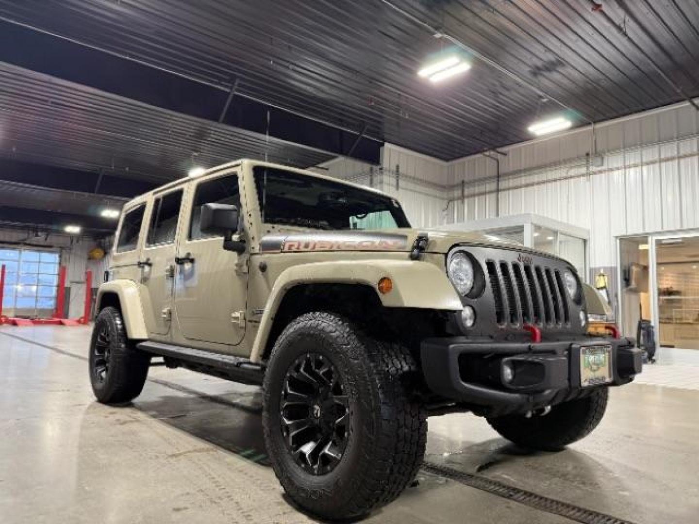 2018 TAN /Black, leather Jeep Wrangler JK Unlimited Rubicon 4WD (1C4BJWFG4JL) with an 3.6L V6 DOHC 24V FFV engine, 6-Speed Automatic transmission, located at 1235 N Woodruff Ave., Idaho Falls, 83401, (208) 523-1053, 43.507172, -112.000488 - Photo#6