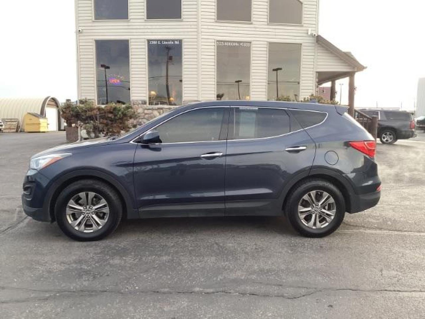 2014 Hyundai Santa Fe Sport 2.4 AWD (5XYZTDLB7EG) with an 2.4L L4 DOHC 16V engine, 6-Speed Automatic transmission, located at 1235 N Woodruff Ave., Idaho Falls, 83401, (208) 523-1053, 43.507172, -112.000488 - Photo#2