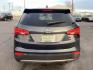 2014 Hyundai Santa Fe Sport 2.4 AWD (5XYZTDLB7EG) with an 2.4L L4 DOHC 16V engine, 6-Speed Automatic transmission, located at 1235 N Woodruff Ave., Idaho Falls, 83401, (208) 523-1053, 43.507172, -112.000488 - Photo#4