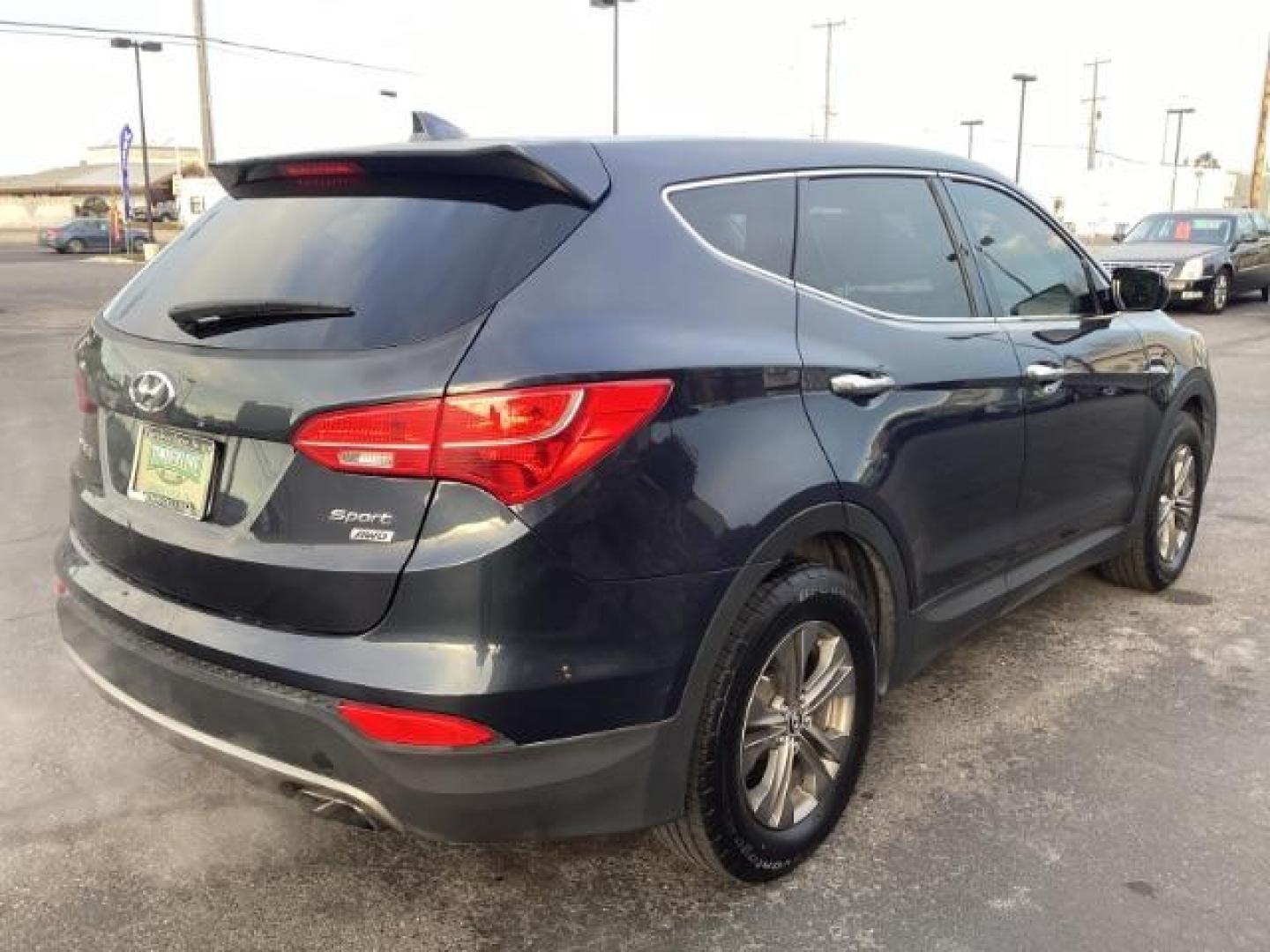 2014 Hyundai Santa Fe Sport 2.4 AWD (5XYZTDLB7EG) with an 2.4L L4 DOHC 16V engine, 6-Speed Automatic transmission, located at 1235 N Woodruff Ave., Idaho Falls, 83401, (208) 523-1053, 43.507172, -112.000488 - Photo#5