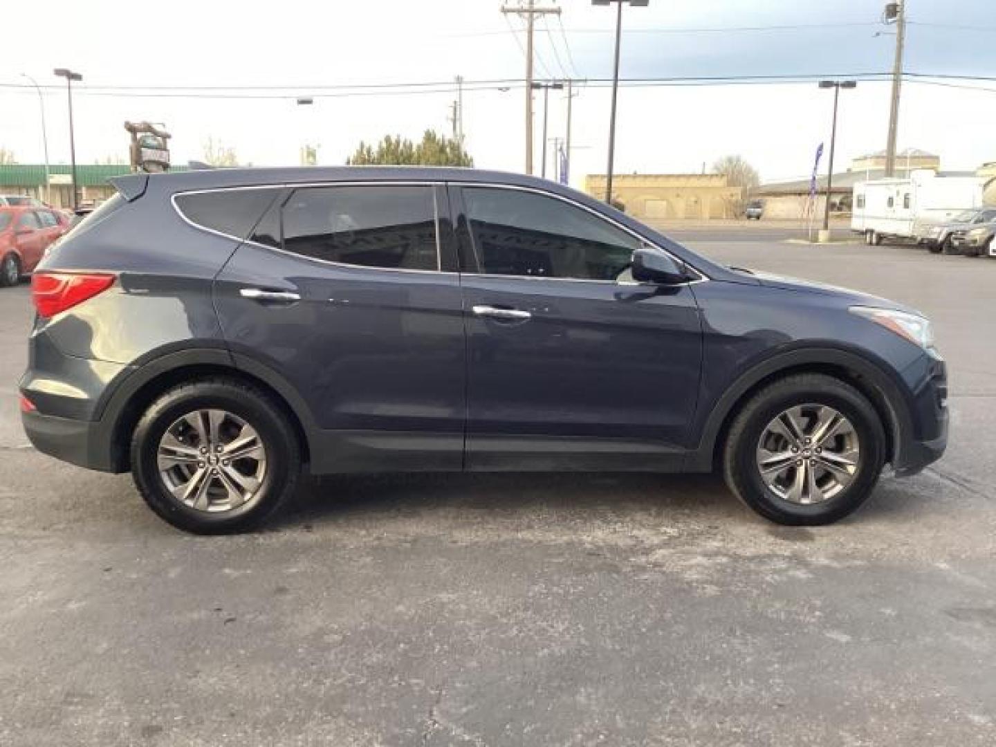 2014 Hyundai Santa Fe Sport 2.4 AWD (5XYZTDLB7EG) with an 2.4L L4 DOHC 16V engine, 6-Speed Automatic transmission, located at 1235 N Woodruff Ave., Idaho Falls, 83401, (208) 523-1053, 43.507172, -112.000488 - Photo#6