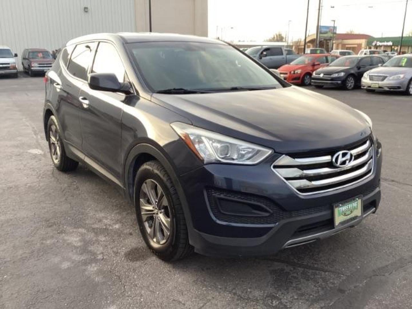 2014 Hyundai Santa Fe Sport 2.4 AWD (5XYZTDLB7EG) with an 2.4L L4 DOHC 16V engine, 6-Speed Automatic transmission, located at 1235 N Woodruff Ave., Idaho Falls, 83401, (208) 523-1053, 43.507172, -112.000488 - Photo#7