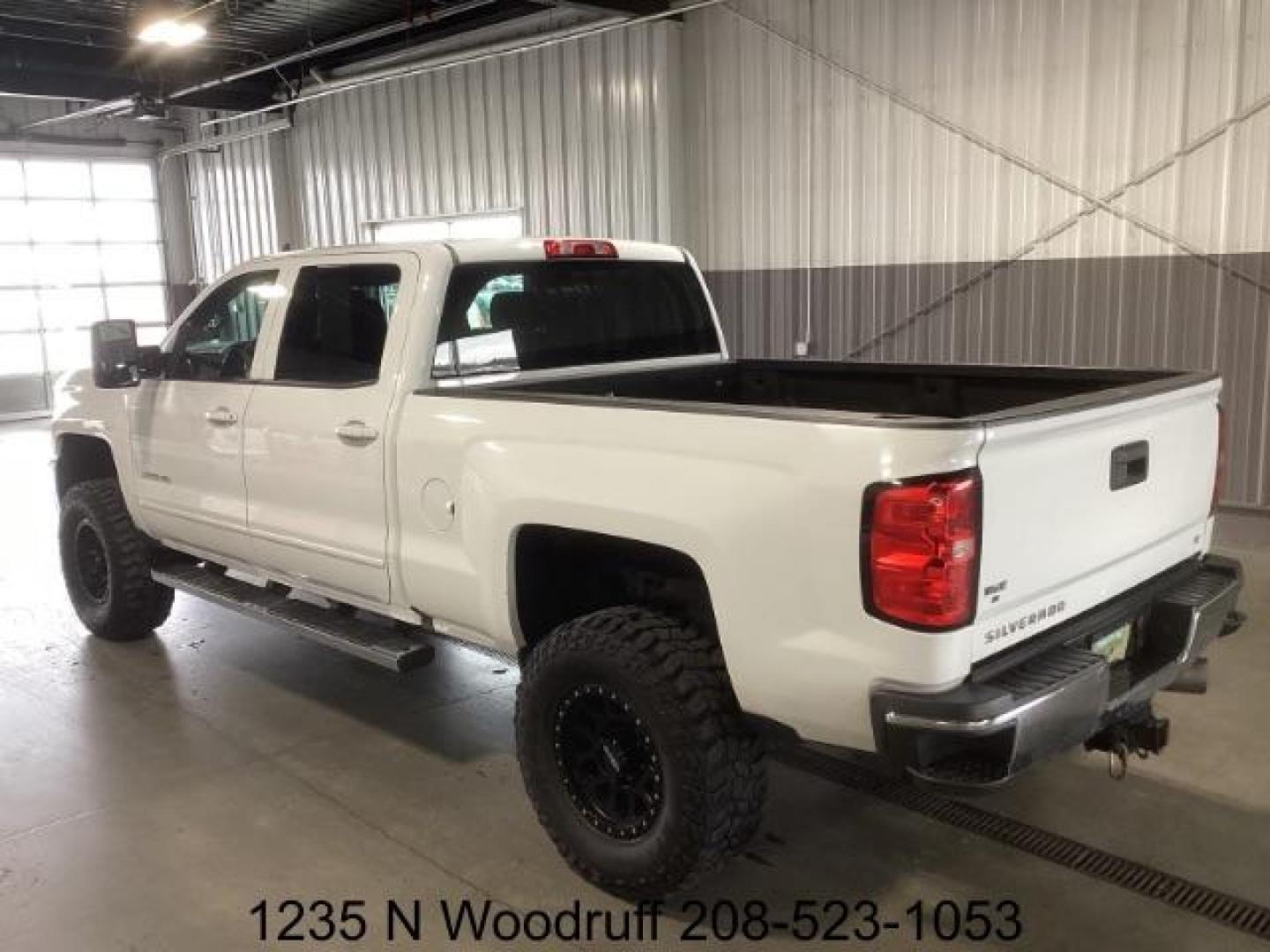 2019 Summit White /Jet Black, cloth Chevrolet Silverado 2500HD LT Crew Cab Short Box 4WD (1GC1KSEY5KF) with an 6.6L V8 OHV 16V DIESEL engine, 6-Speed Automatic transmission, located at 1235 N Woodruff Ave., Idaho Falls, 83401, (208) 523-1053, 43.507172, -112.000488 - Photo#2