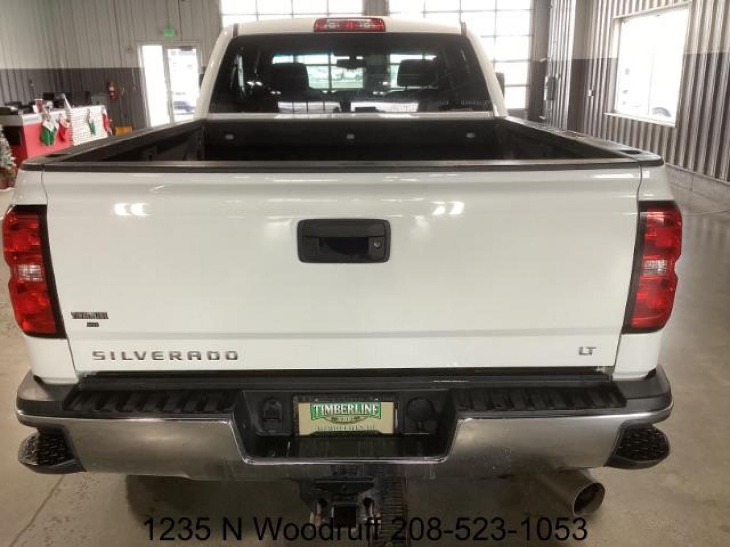 2019 Summit White /Jet Black, cloth Chevrolet Silverado 2500HD LT Crew Cab Short Box 4WD (1GC1KSEY5KF) with an 6.6L V8 OHV 16V DIESEL engine, 6-Speed Automatic transmission, located at 1235 N Woodruff Ave., Idaho Falls, 83401, (208) 523-1053, 43.507172, -112.000488 - Photo#3