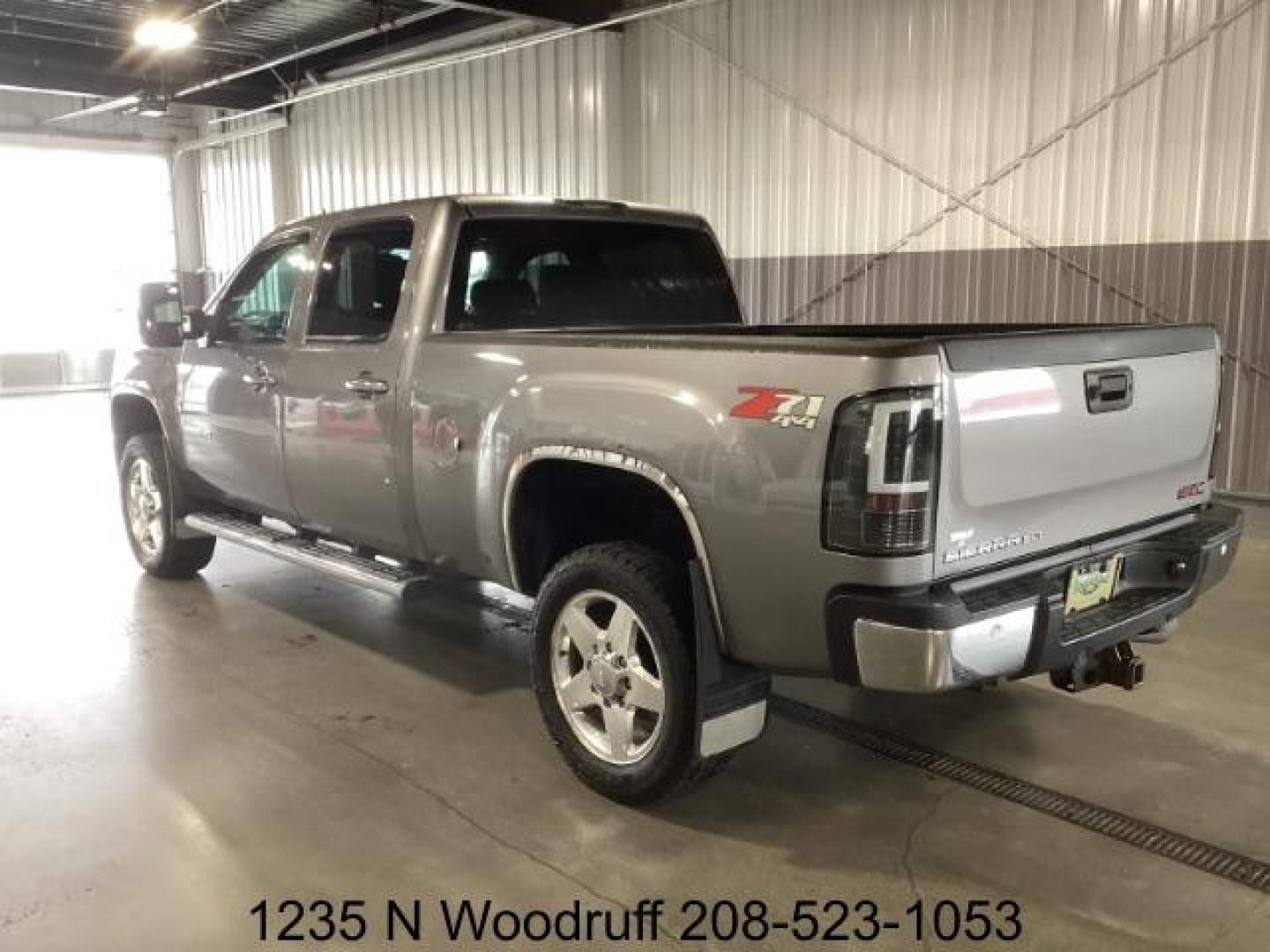 2013 Quicksilver Metallic /Ebony Leather Interior GMC Sierra 2500HD SLT Crew Cab 4WD (1GT121C8XDF) with an 6.6L V8 OHV 32V TURBO DIESEL engine, 6-Speed Automatic transmission, located at 1235 N Woodruff Ave., Idaho Falls, 83401, (208) 523-1053, 43.507172, -112.000488 - Photo#2