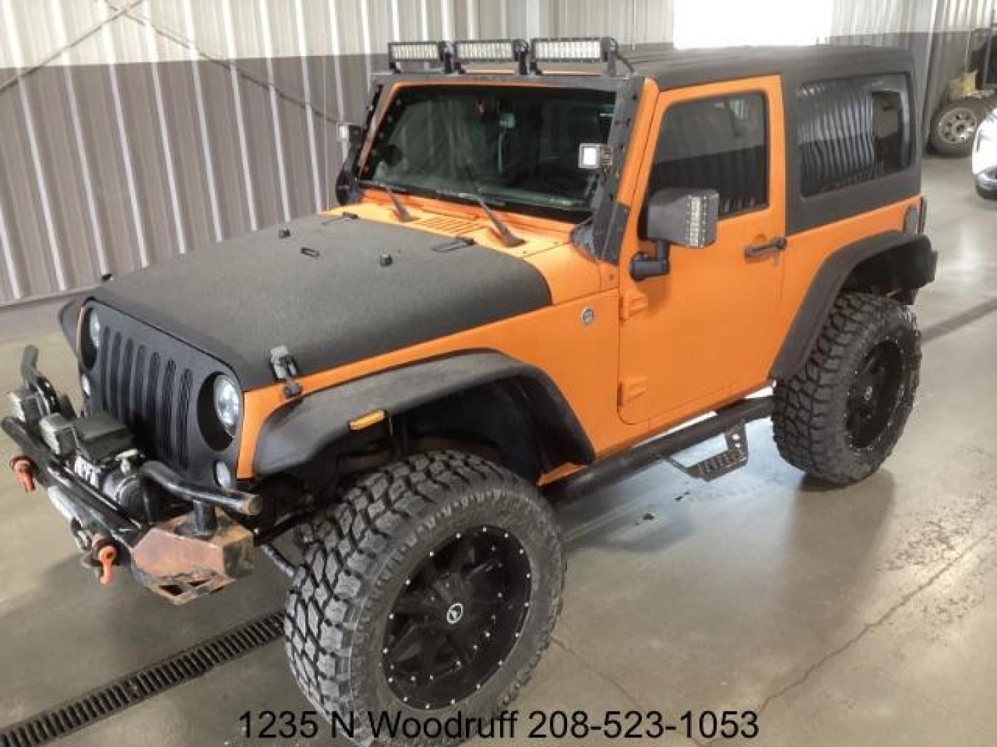 2014 ORANGE /Black Jeep Wrangler Sport 4WD (1C4AJWAG5EL) with an 3.6L V6 DOHC 24V FFV engine, 5-Speed Automatic transmission, located at 1235 N Woodruff Ave., Idaho Falls, 83401, (208) 523-1053, 43.507172, -112.000488 - Photo#0