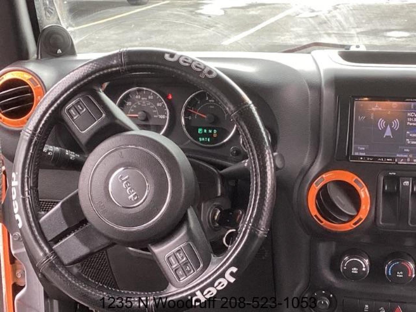 2014 ORANGE /Black Jeep Wrangler Sport 4WD (1C4AJWAG5EL) with an 3.6L V6 DOHC 24V FFV engine, 5-Speed Automatic transmission, located at 1235 N Woodruff Ave., Idaho Falls, 83401, (208) 523-1053, 43.507172, -112.000488 - Photo#12