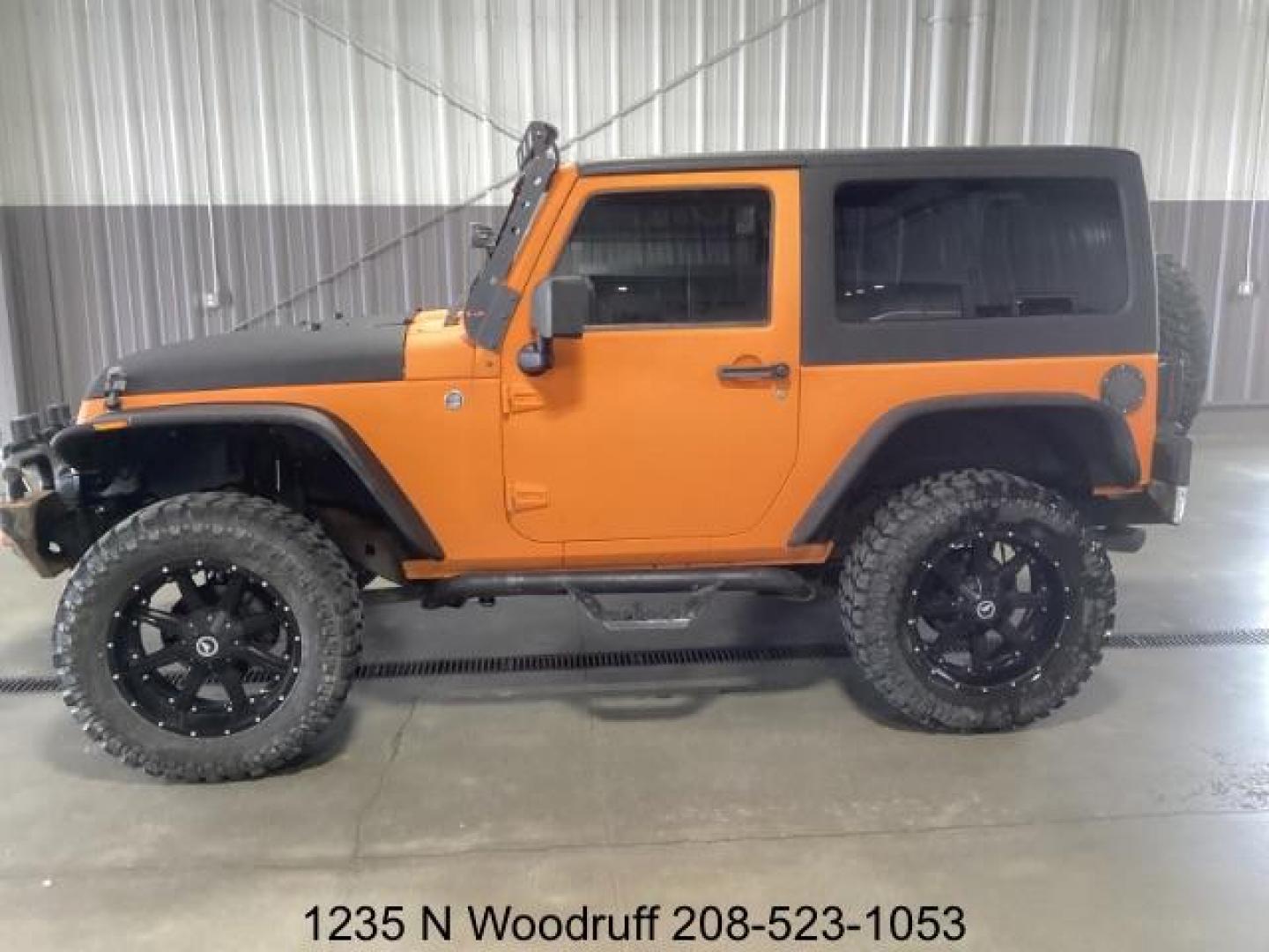 2014 ORANGE /Black Jeep Wrangler Sport 4WD (1C4AJWAG5EL) with an 3.6L V6 DOHC 24V FFV engine, 5-Speed Automatic transmission, located at 1235 N Woodruff Ave., Idaho Falls, 83401, (208) 523-1053, 43.507172, -112.000488 - Photo#1