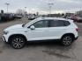 2023 Pure White /Black Volkswagen Taos SE 4Motion (3VVNX7B27PM) with an 1.5L L4 SFI DOHC 16V engine, 7-Speed Automatic transmission, located at 1235 N Woodruff Ave., Idaho Falls, 83401, (208) 523-1053, 43.507172, -112.000488 - Photo#0