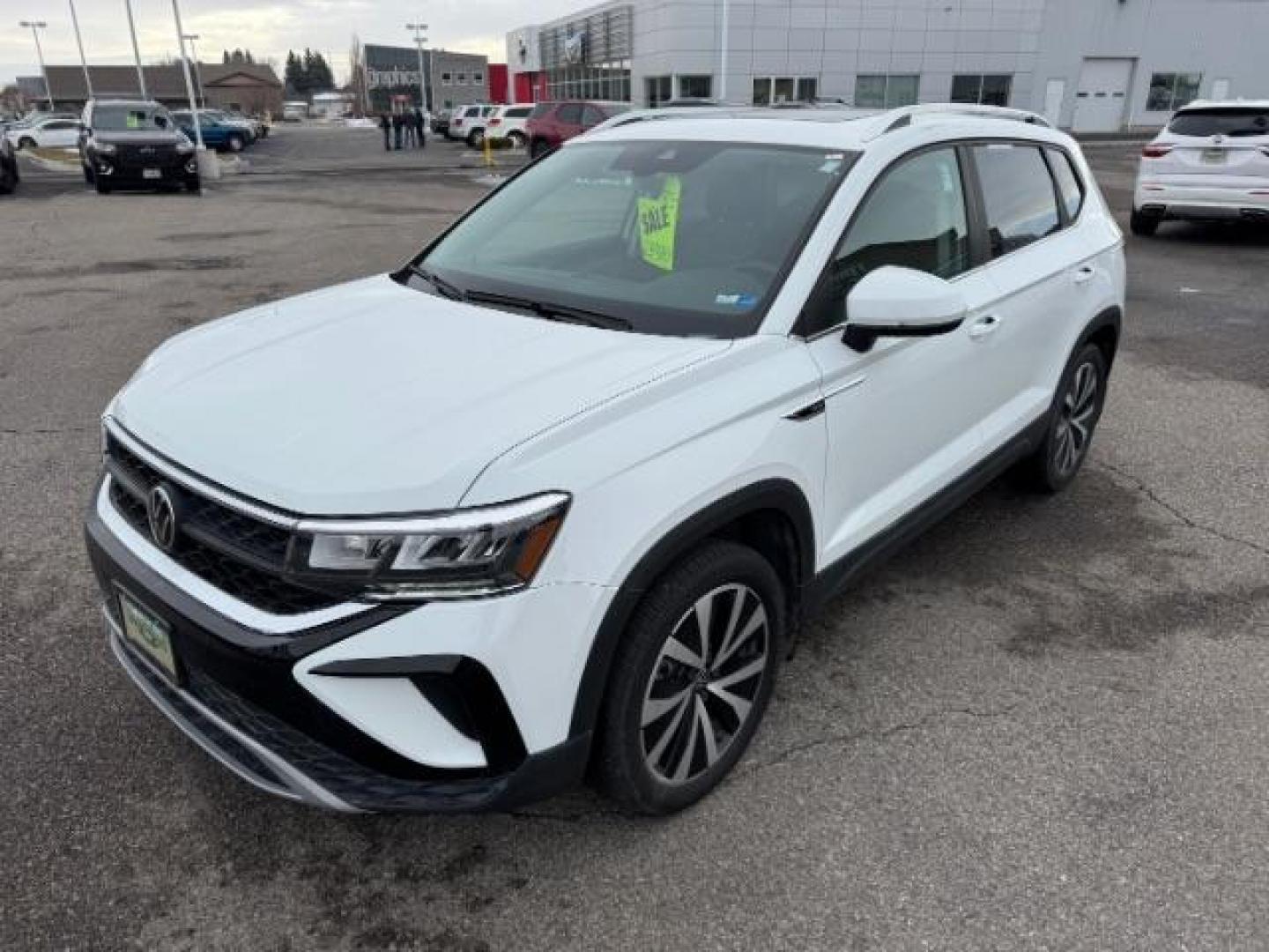 2023 Pure White /Black Volkswagen Taos SE 4Motion (3VVNX7B27PM) with an 1.5L L4 SFI DOHC 16V engine, 7-Speed Automatic transmission, located at 1235 N Woodruff Ave., Idaho Falls, 83401, (208) 523-1053, 43.507172, -112.000488 - Photo#1