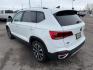 2023 Pure White /Black Volkswagen Taos SE 4Motion (3VVNX7B27PM) with an 1.5L L4 SFI DOHC 16V engine, 7-Speed Automatic transmission, located at 1235 N Woodruff Ave., Idaho Falls, 83401, (208) 523-1053, 43.507172, -112.000488 - Photo#2