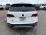 2023 Pure White /Black Volkswagen Taos SE 4Motion (3VVNX7B27PM) with an 1.5L L4 SFI DOHC 16V engine, 7-Speed Automatic transmission, located at 1235 N Woodruff Ave., Idaho Falls, 83401, (208) 523-1053, 43.507172, -112.000488 - Photo#3