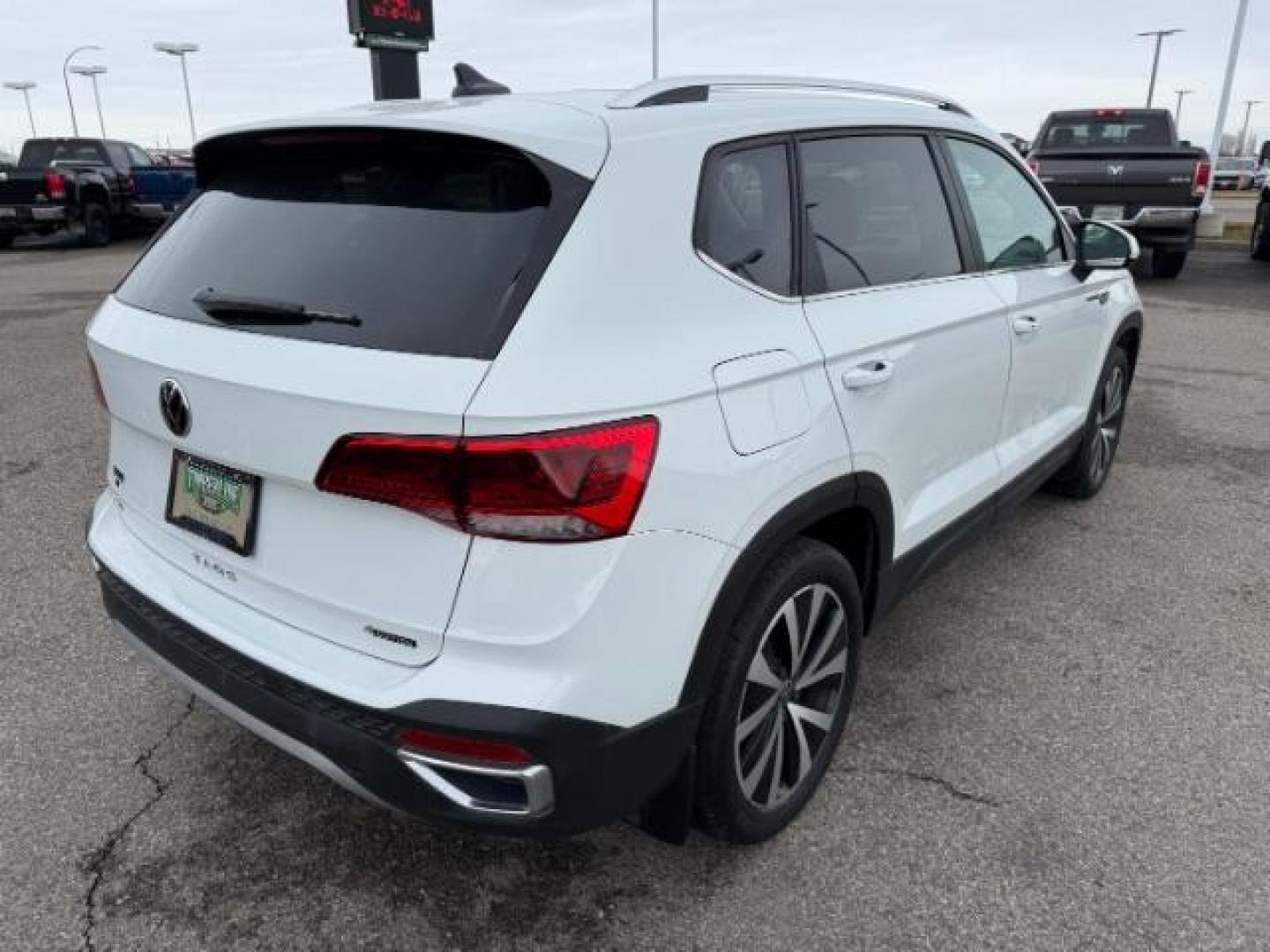 2023 Pure White /Black Volkswagen Taos SE 4Motion (3VVNX7B27PM) with an 1.5L L4 SFI DOHC 16V engine, 7-Speed Automatic transmission, located at 1235 N Woodruff Ave., Idaho Falls, 83401, (208) 523-1053, 43.507172, -112.000488 - Photo#4