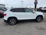 2023 Pure White /Black Volkswagen Taos SE 4Motion (3VVNX7B27PM) with an 1.5L L4 SFI DOHC 16V engine, 7-Speed Automatic transmission, located at 1235 N Woodruff Ave., Idaho Falls, 83401, (208) 523-1053, 43.507172, -112.000488 - Photo#5