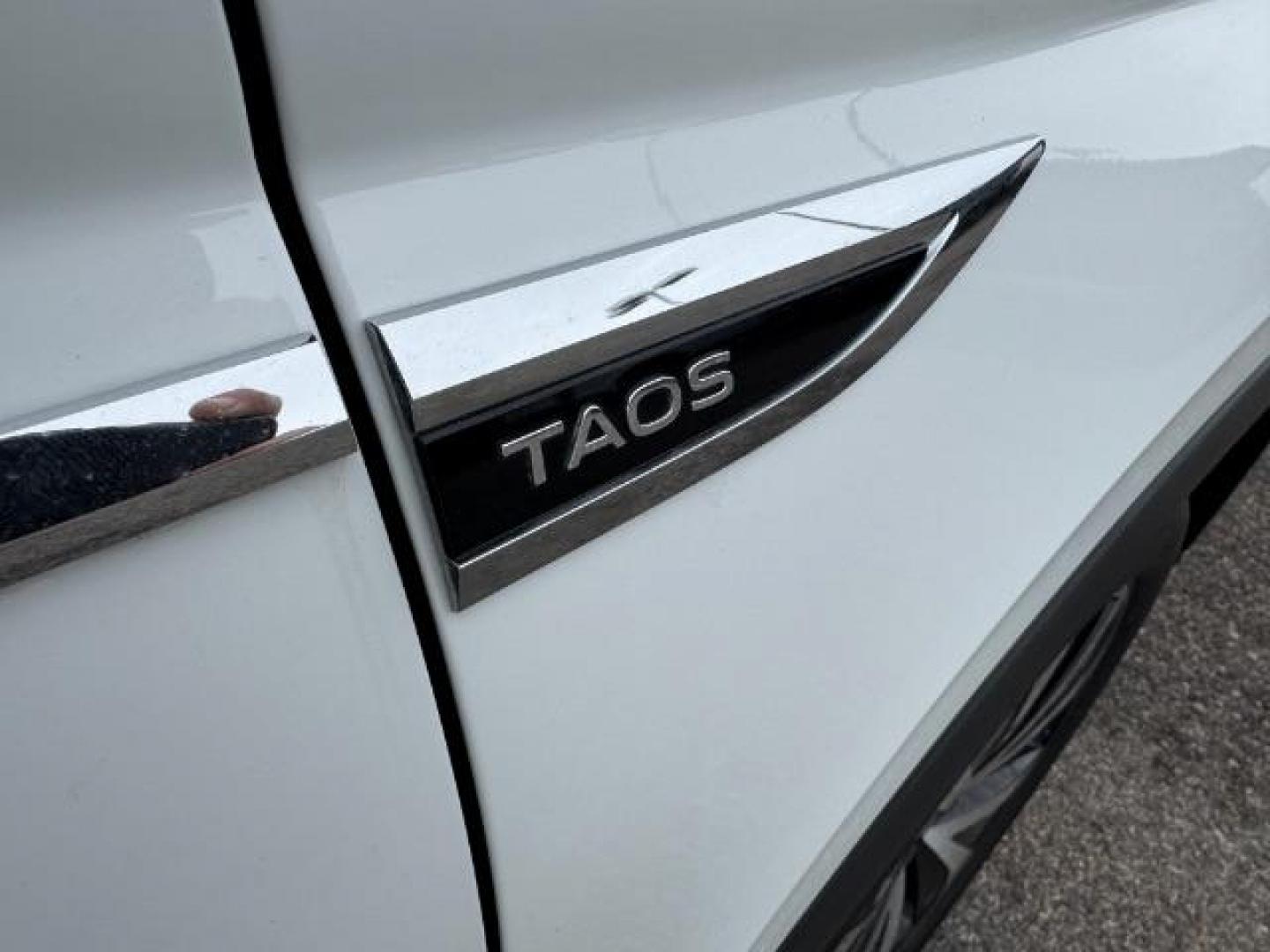 2023 Pure White /Black Volkswagen Taos SE 4Motion (3VVNX7B27PM) with an 1.5L L4 SFI DOHC 16V engine, 7-Speed Automatic transmission, located at 1235 N Woodruff Ave., Idaho Falls, 83401, (208) 523-1053, 43.507172, -112.000488 - Photo#7