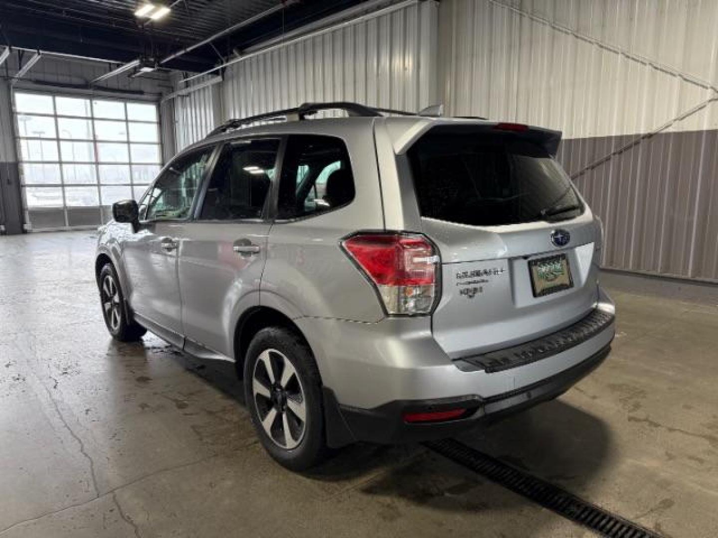 2018 Ice Silver Metallic /Black, leather Subaru Forester 2.5i Touring (JF2SJARC3JH) with an 2.5L H4 SOHC 16V engine, Continuously Variable Transmission transmission, located at 1235 N Woodruff Ave., Idaho Falls, 83401, (208) 523-1053, 43.507172, -112.000488 - Photo#2