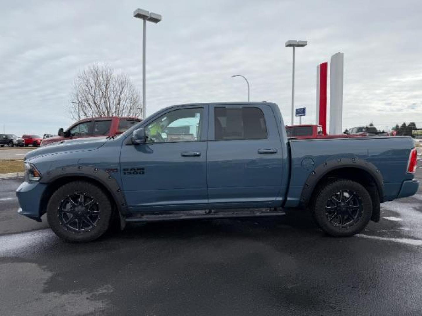 2015 BLUE /LEATHER RAM 1500 Sport Crew Cab SWB 4WD (1C6RR7MT9FS) with an 5.7L V8 OHV 16V engine, 8-Speed Automatic transmission, located at 1235 N Woodruff Ave., Idaho Falls, 83401, (208) 523-1053, 43.507172, -112.000488 - Photo#1