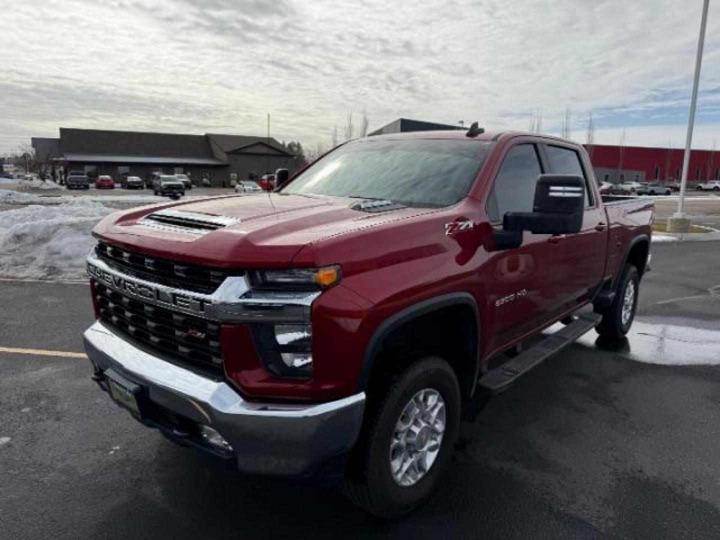 2023 Cherry Red Tintcoat /Jet Black Chevrolet Silverado 2500HD LT Crew Cab Short Box 4WD (1GC4YNEY1PF) with an 6.6L V8 OHV 16V DIESEL engine, 6-Speed Automatic transmission, located at 1235 N Woodruff Ave., Idaho Falls, 83401, (208) 523-1053, 43.507172, -112.000488 - Photo#0