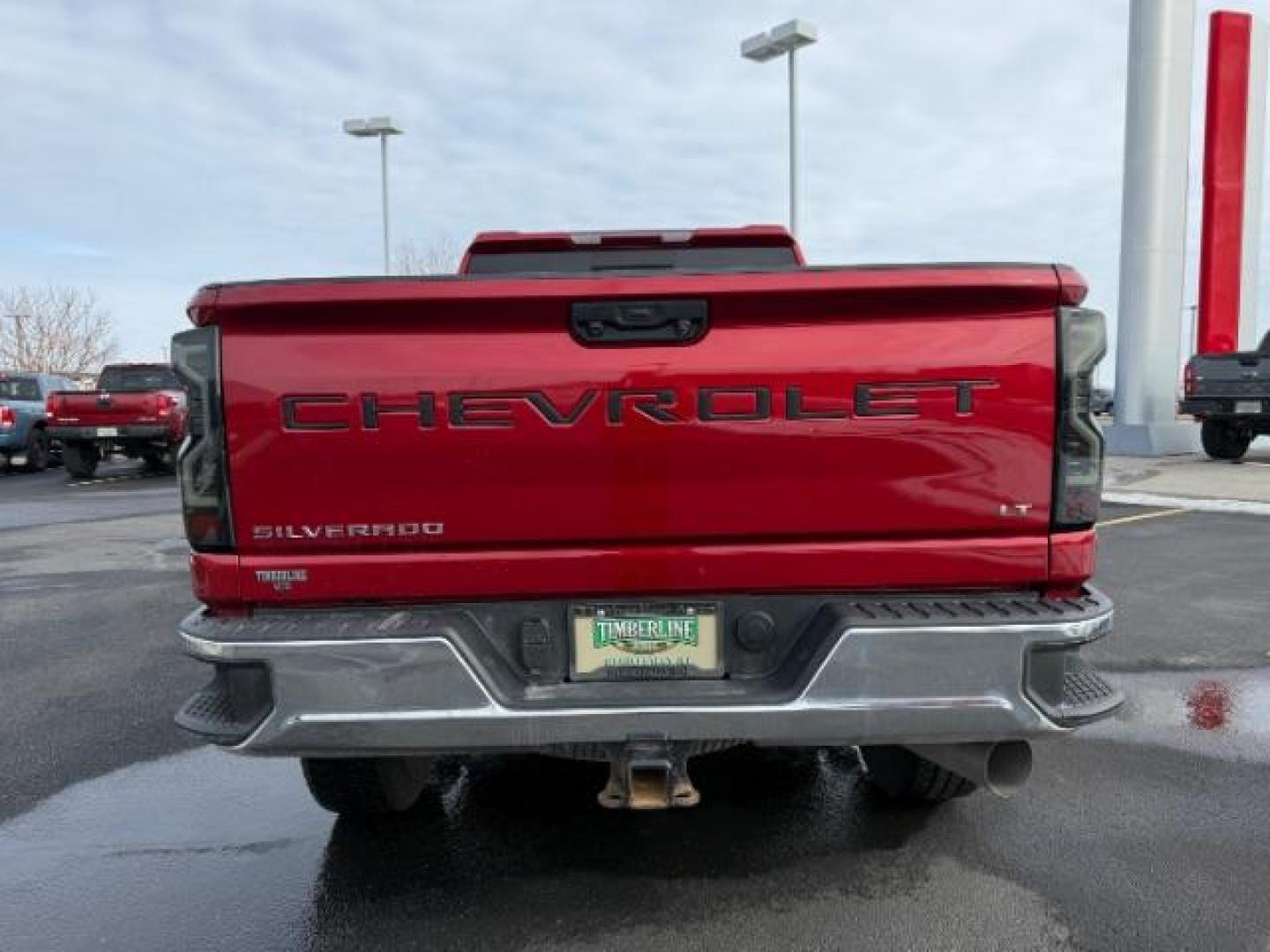 2023 Cherry Red Tintcoat /Jet Black Chevrolet Silverado 2500HD LT Crew Cab Short Box 4WD (1GC4YNEY1PF) with an 6.6L V8 OHV 16V DIESEL engine, 6-Speed Automatic transmission, located at 1235 N Woodruff Ave., Idaho Falls, 83401, (208) 523-1053, 43.507172, -112.000488 - Photo#3