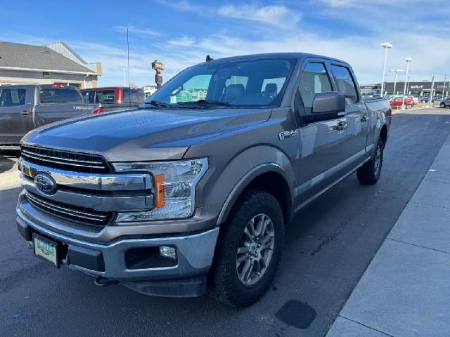 2019 BROWN /Medium Earth Gray FORD F150 LARIAT (1FTFW1E59KF) with an 5L V-8 port/direct injection engine, AUTOMATIC transmission, located at 1235 N Woodruff Ave., Idaho Falls, 83401, (208) 523-1053, 43.507172, -112.000488 - Photo#0