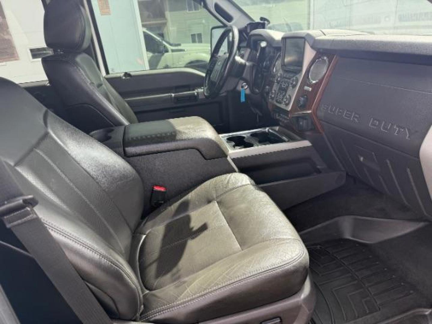 2014 White Platinum Metallic Tri-Coat /Black Ford F-350 LARIAT (1FT8W3BT4EE) with an 6.7 engine, AUTOMATIC transmission, located at 1235 N Woodruff Ave., Idaho Falls, 83401, (208) 523-1053, 43.507172, -112.000488 - At Timberline Auto, finding a great deal on your next vehicle is always easy! Our experienced sales staff's goal is to help find you the right vehicle at the right price! Our knowledgeable finance department has options for almost any credit score. We offer extended service contract options to prote - Photo#17