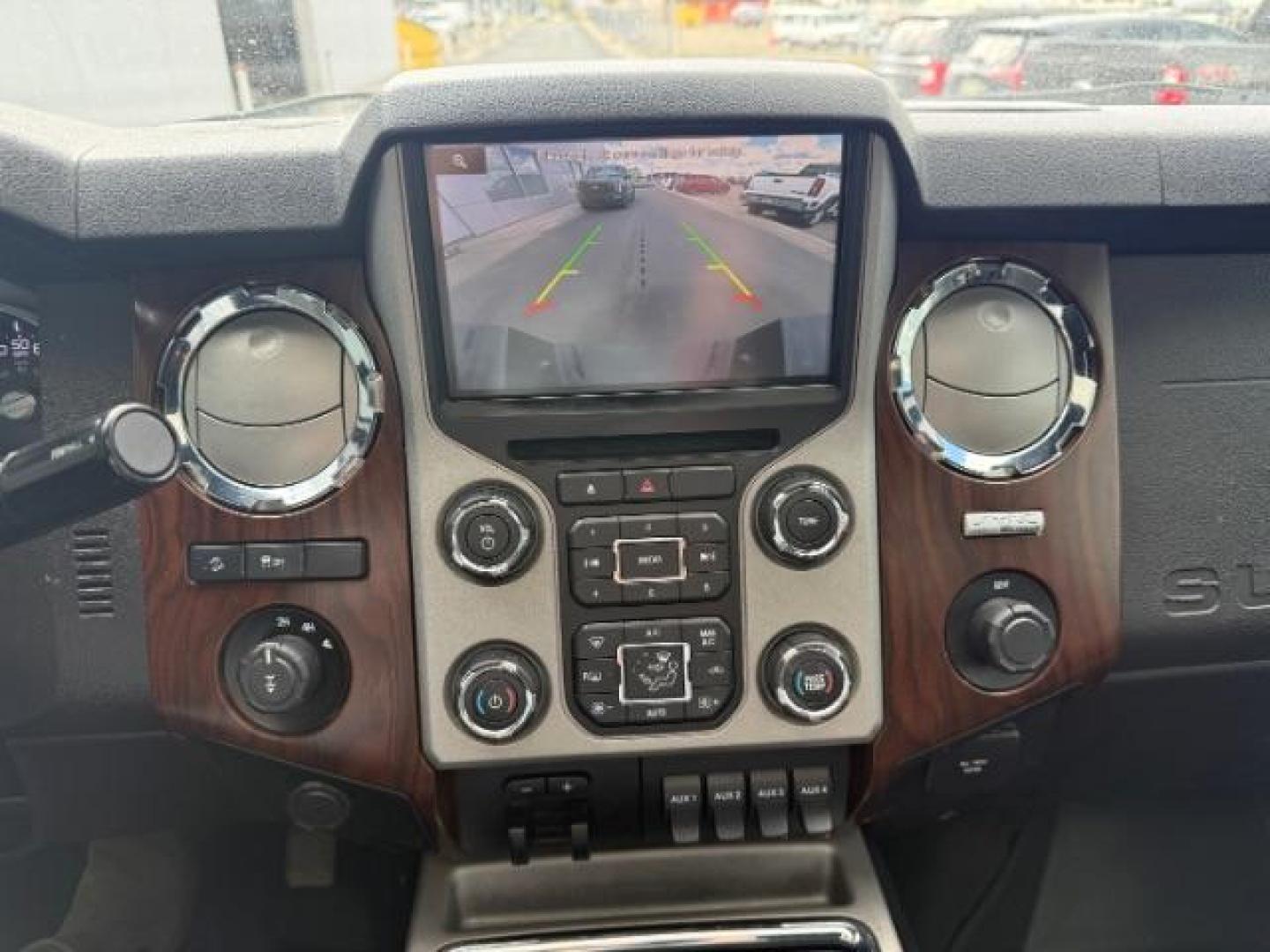 2014 White Platinum Metallic Tri-Coat /Black Ford F-350 LARIAT (1FT8W3BT4EE) with an 6.7 engine, AUTOMATIC transmission, located at 1235 N Woodruff Ave., Idaho Falls, 83401, (208) 523-1053, 43.507172, -112.000488 - At Timberline Auto, finding a great deal on your next vehicle is always easy! Our experienced sales staff's goal is to help find you the right vehicle at the right price! Our knowledgeable finance department has options for almost any credit score. We offer extended service contract options to prote - Photo#30
