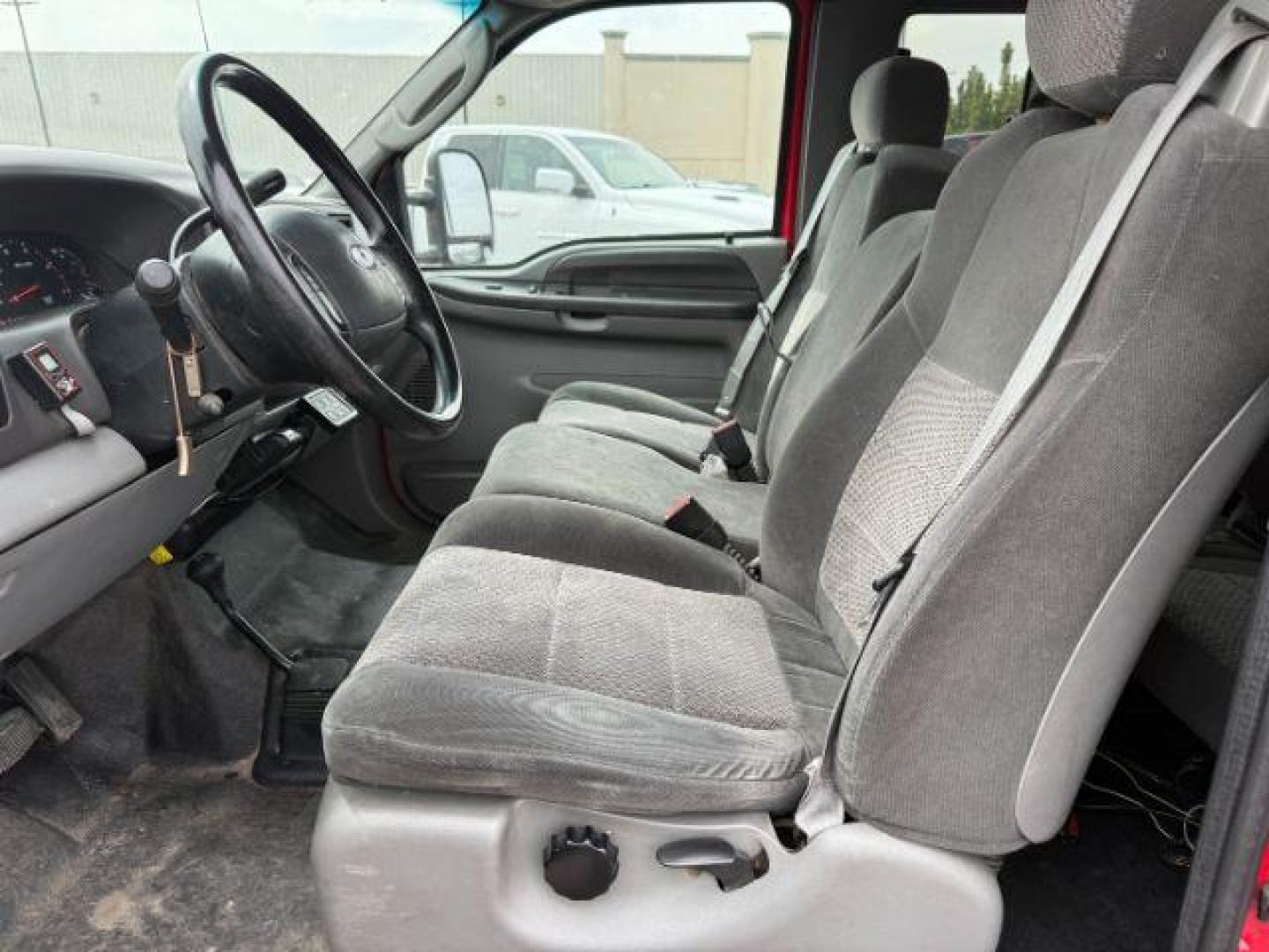 2003 Red Clearcoat /Medium Flint Ford F-350 XLT (1FTWX33F73E) with an Powerstroke 6L V-8 diesel direct injection engine, AUTOMATIC transmission, located at 1235 N Woodruff Ave., Idaho Falls, 83401, (208) 523-1053, 43.507172, -112.000488 - At Timberline Auto, finding a great deal on your next vehicle is always easy! Our experienced sales staff's goal is to help find you the right vehicle at the right price! Our knowledgeable finance department has options for almost any credit score. We offer extended service contract options to prote - Photo#9